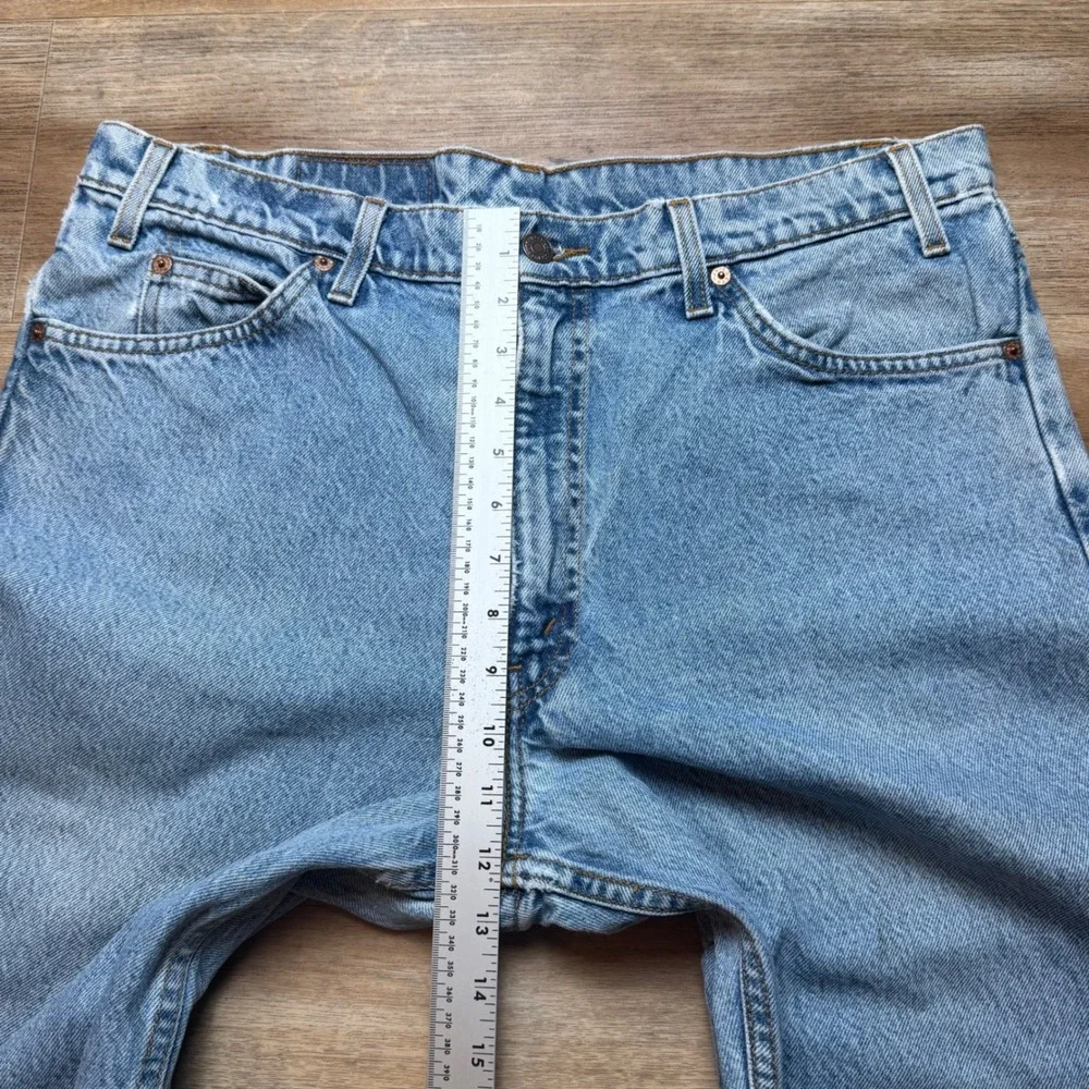 Vintage Levi's 550 Relaxed Fit Jeans Men 38x32 Light Wash Orange Tab Denim 1997